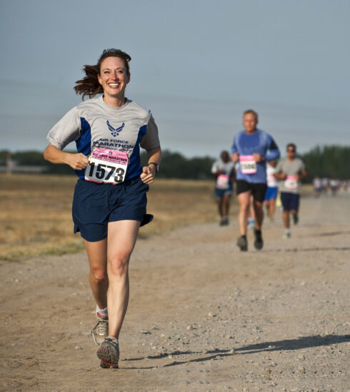 Woman Leading the Runners
